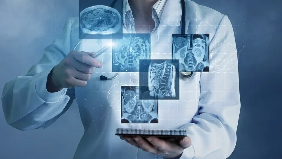 Doctor holding x-rays